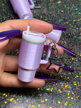 Mini tumbler fidget clicker keychain.